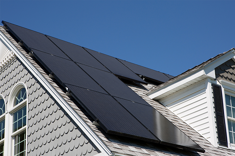 Close-up of solar panels on house roof